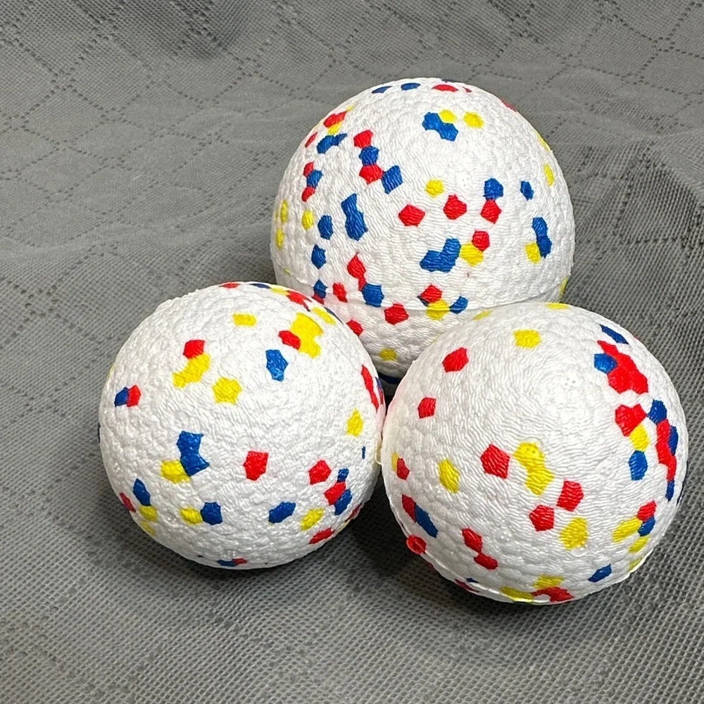 3 pack Vibrant Dog Play Balls with Red, Blue, and Yellow Accents 1 large 2 med
